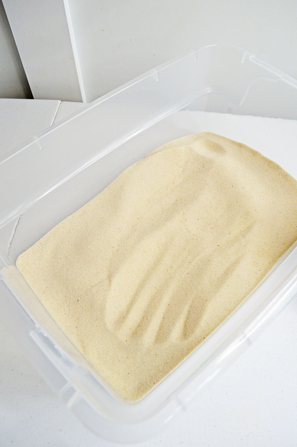 sand in sensory bin