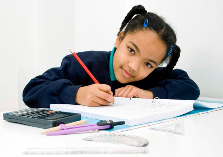 girl studying math fractions