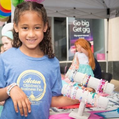 Girl Selling Jewelry at Acton Children's Business Fair