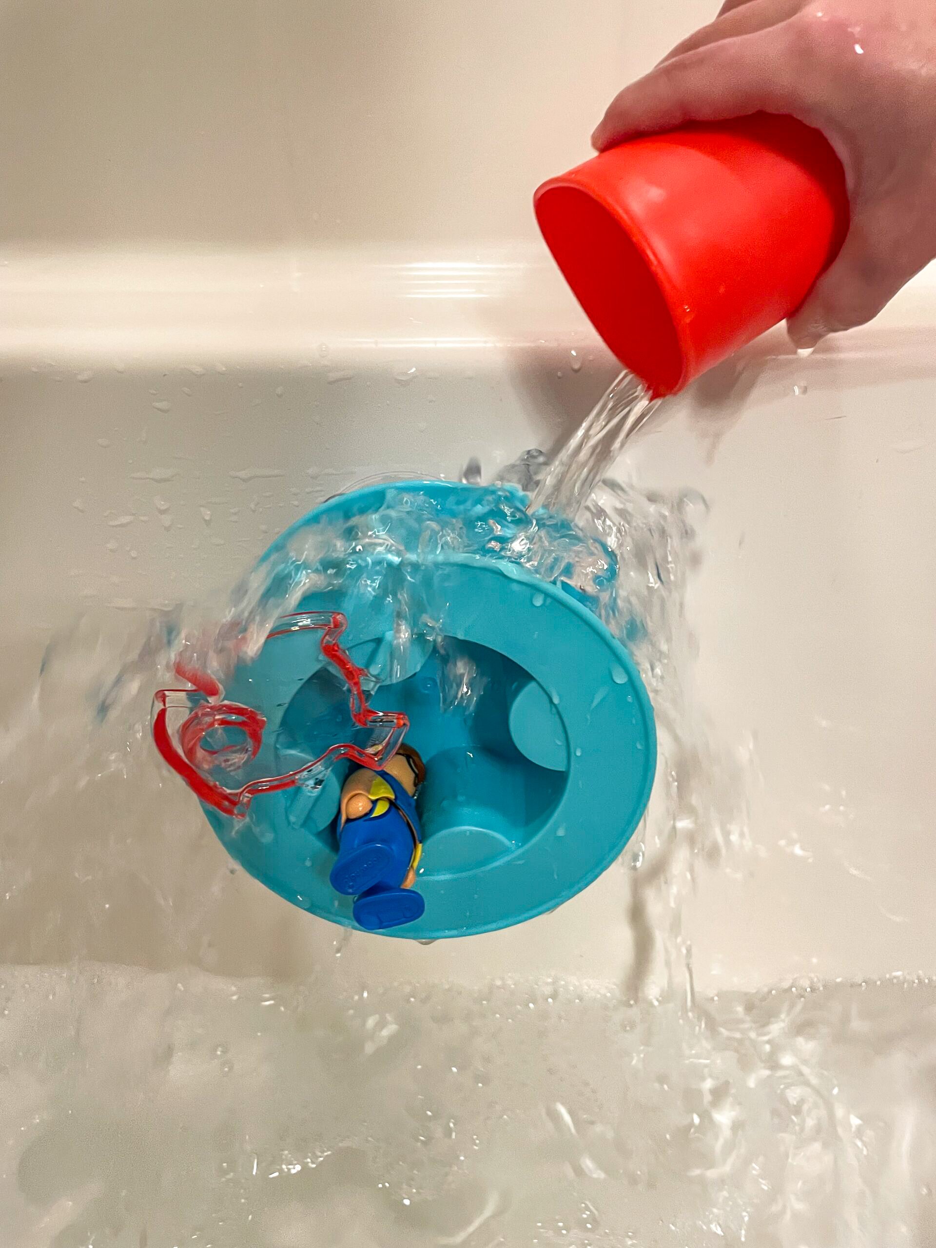 playmobil figure in water wheel