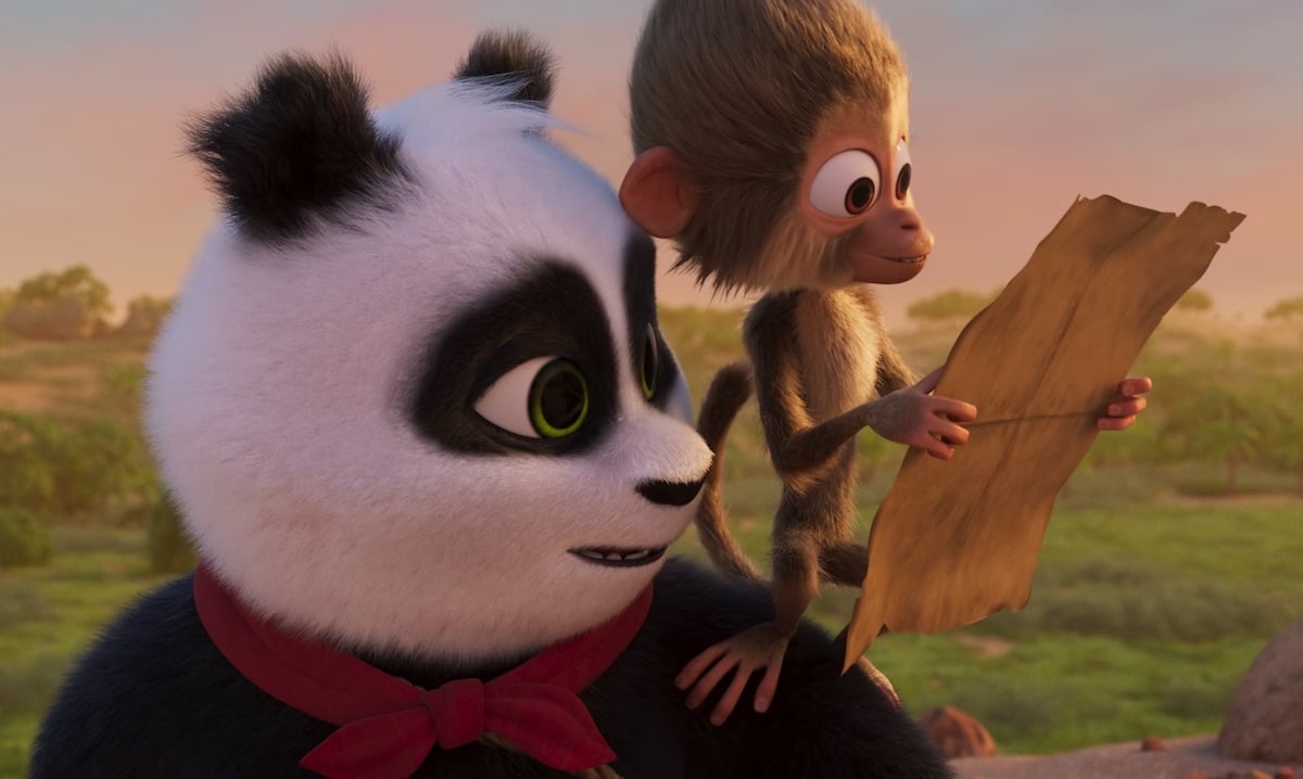 Jojo checks the map with Pang in the movie Panda Bear in Africa.